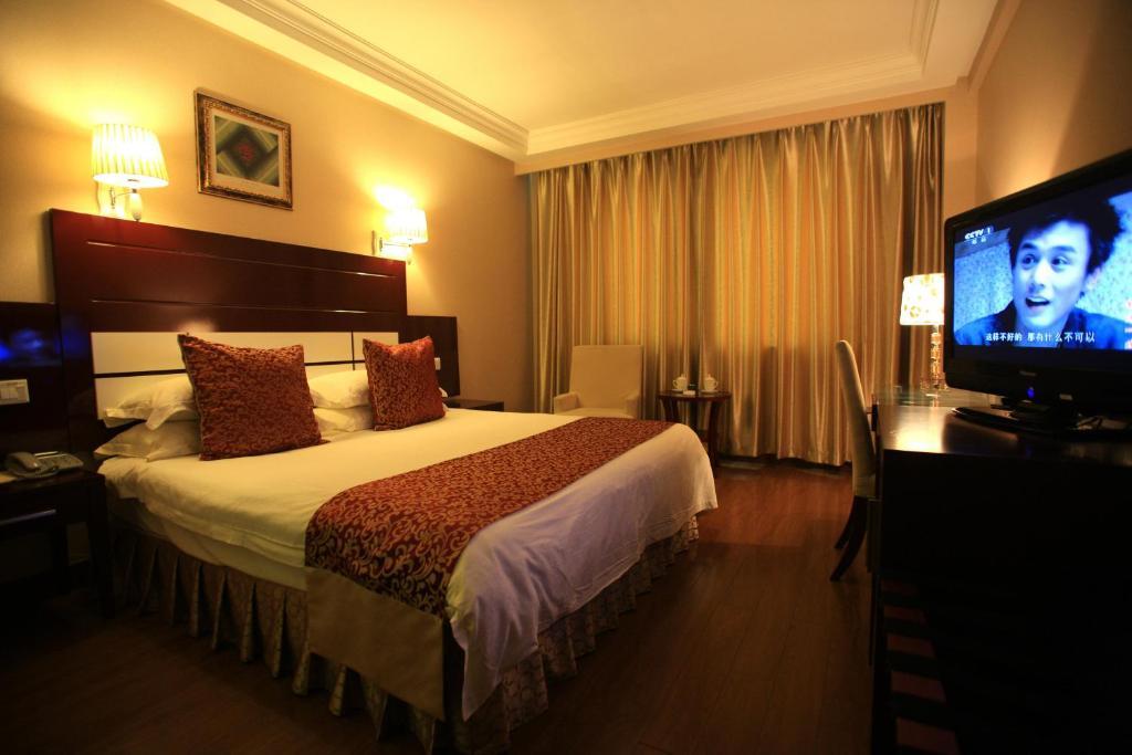 Overseas Chinese International Hotel Qingdao Rom bilde