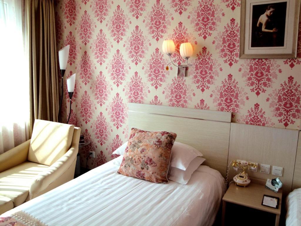 Overseas Chinese International Hotel Qingdao Rom bilde