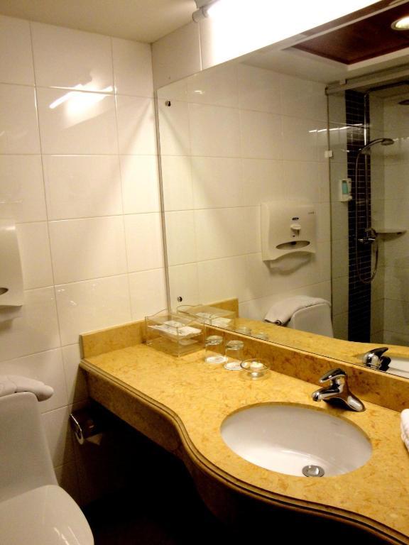 Overseas Chinese International Hotel Qingdao Rom bilde