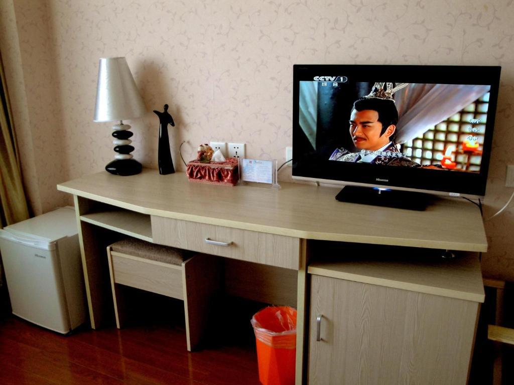 Overseas Chinese International Hotel Qingdao Rom bilde